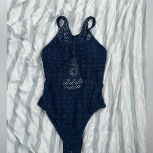 Size medium, for older children, younger teens, navy blue, worn a couple times